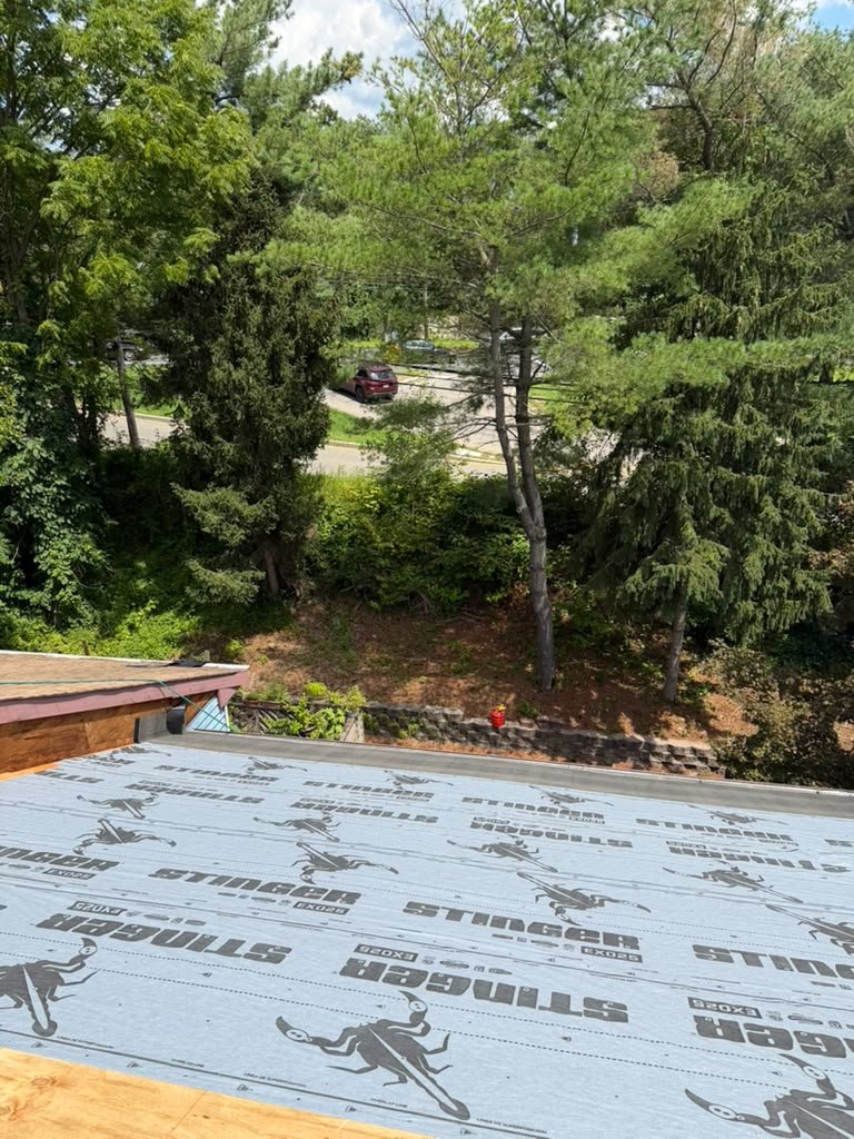 STINGER EXO25 synthetic underlayment during a North Brunswick roof replacement