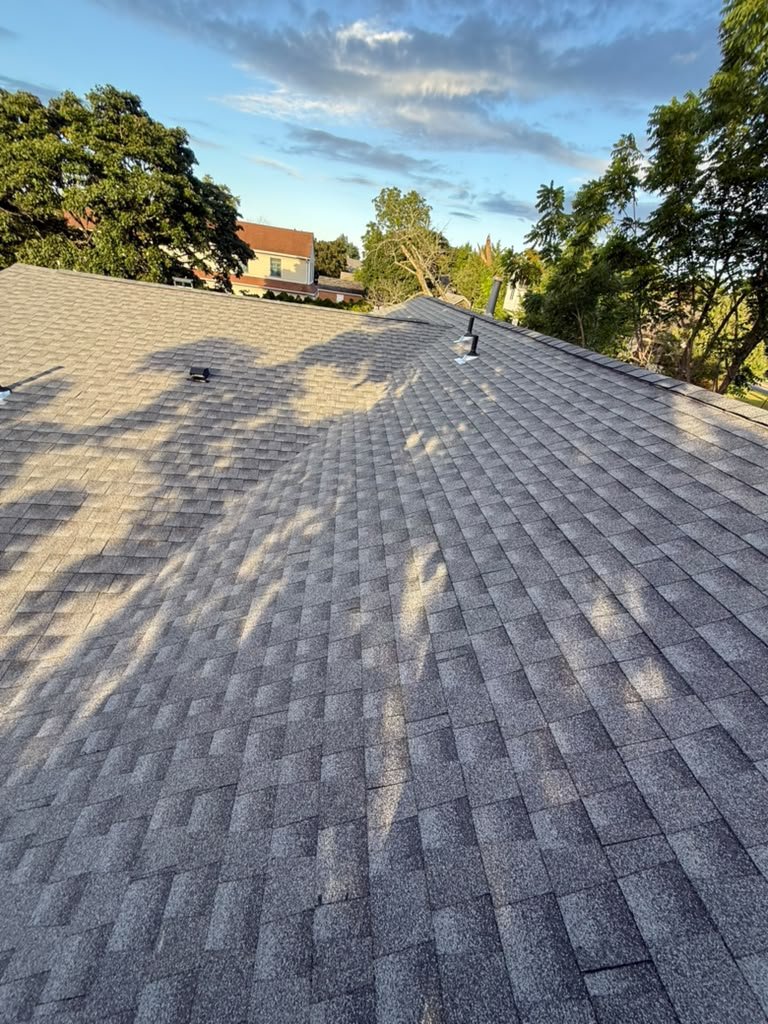 Completed architectural shingle installation on a Toms River home