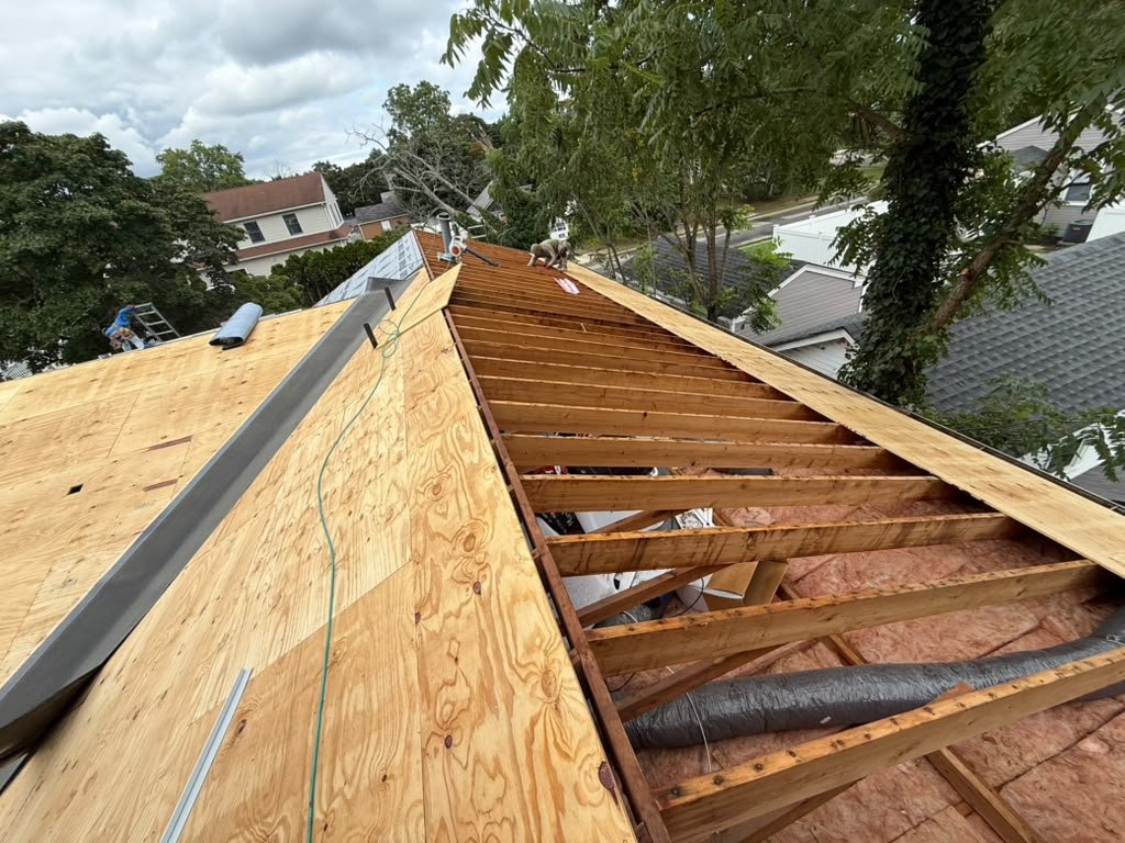 Extensive roof redecking with existing framing retained in Toms River