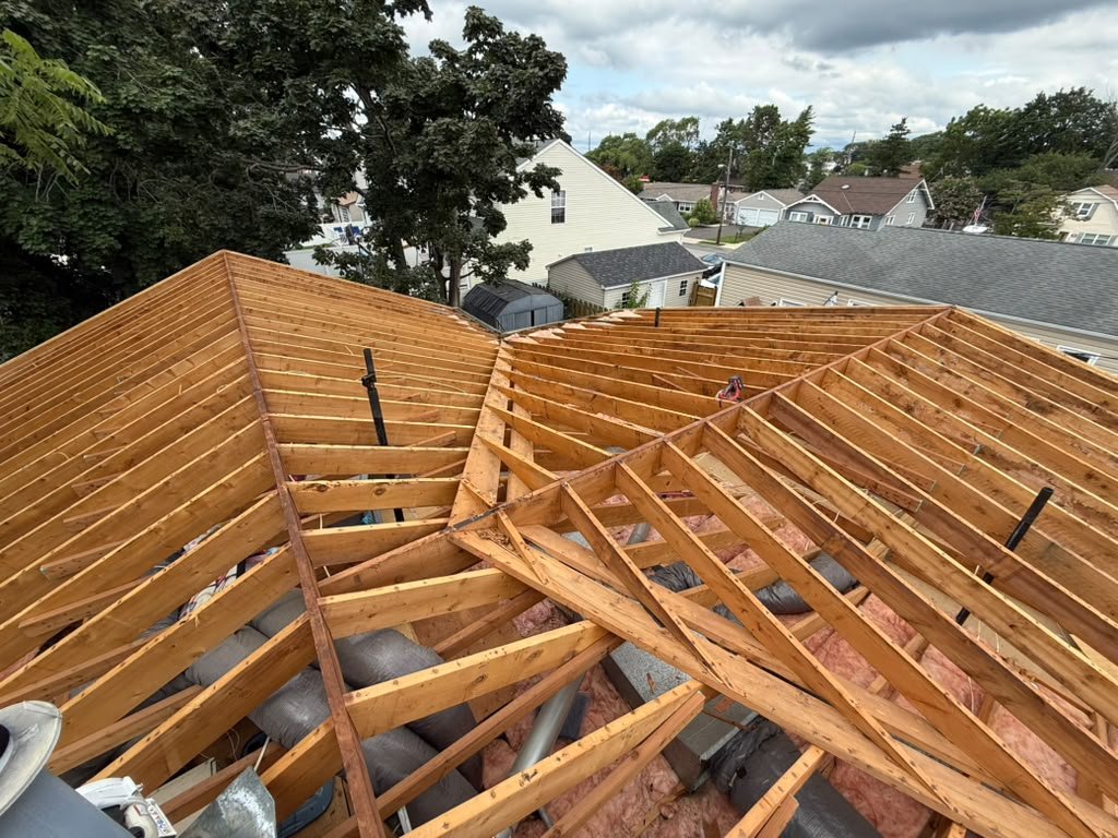Multi-plane roof framing during a Toms River roof replacement