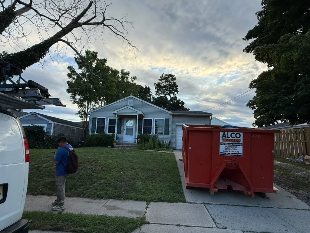 Toms River roof replacement worksite and completed residential roof view