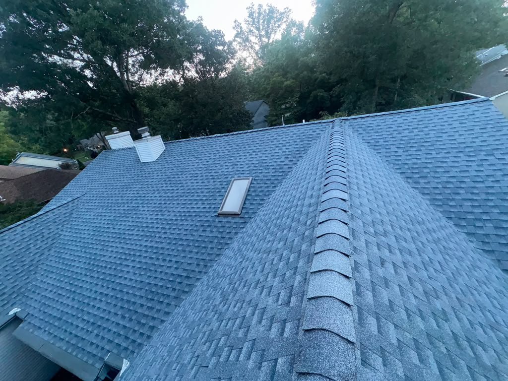 Biscayne Blue shingles on a completed Whiting residential roof replacement