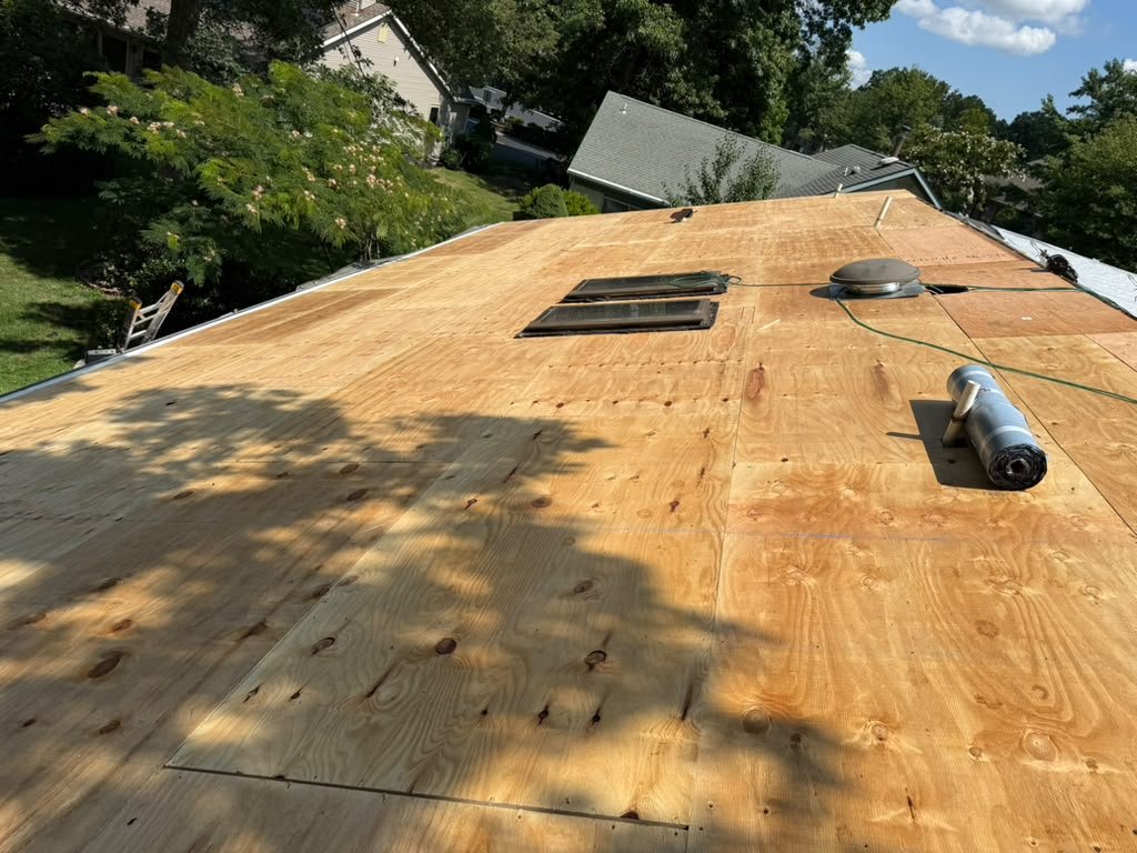 New plywood roof decking prepared for a Whiting roof replacement
