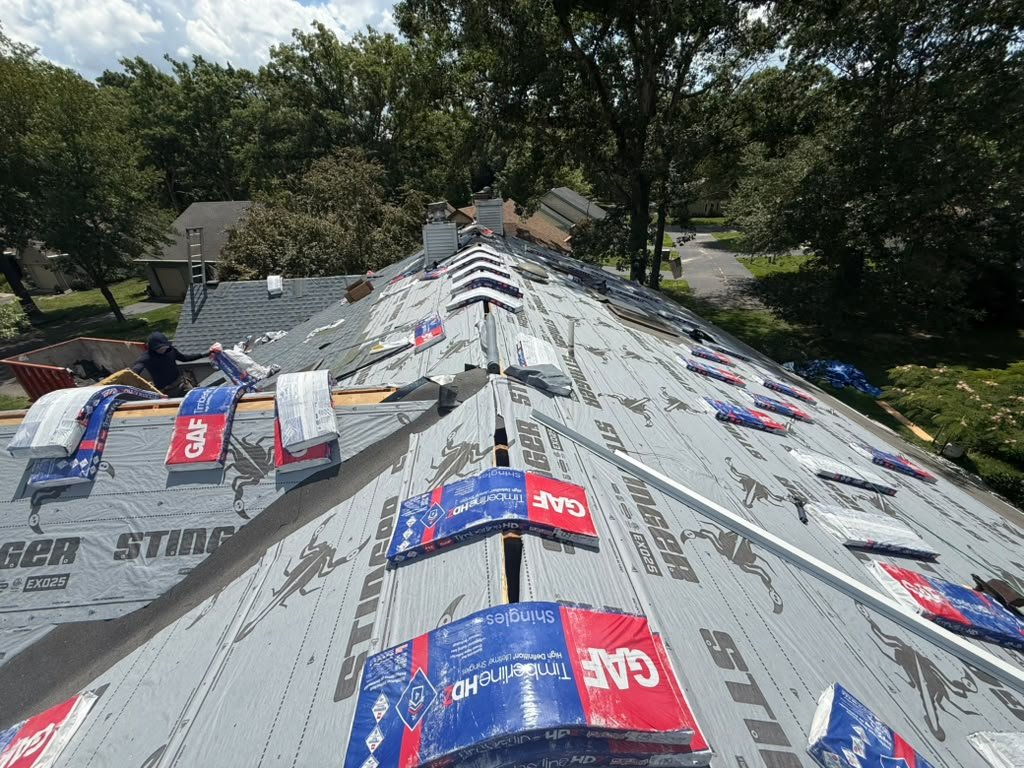 STINGER EXO25 underlayment and GAF shingles during a Whiting roof replacement