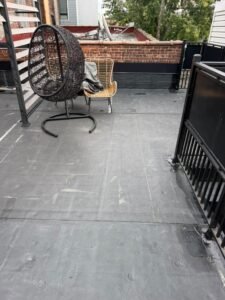 Montclair NJ completed EPDM roof surface and perimeter flashing