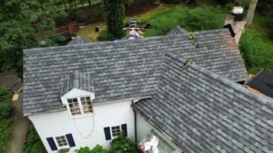 Finished Camelot shingle roof and chimney detail in Franklin Lakes NJ