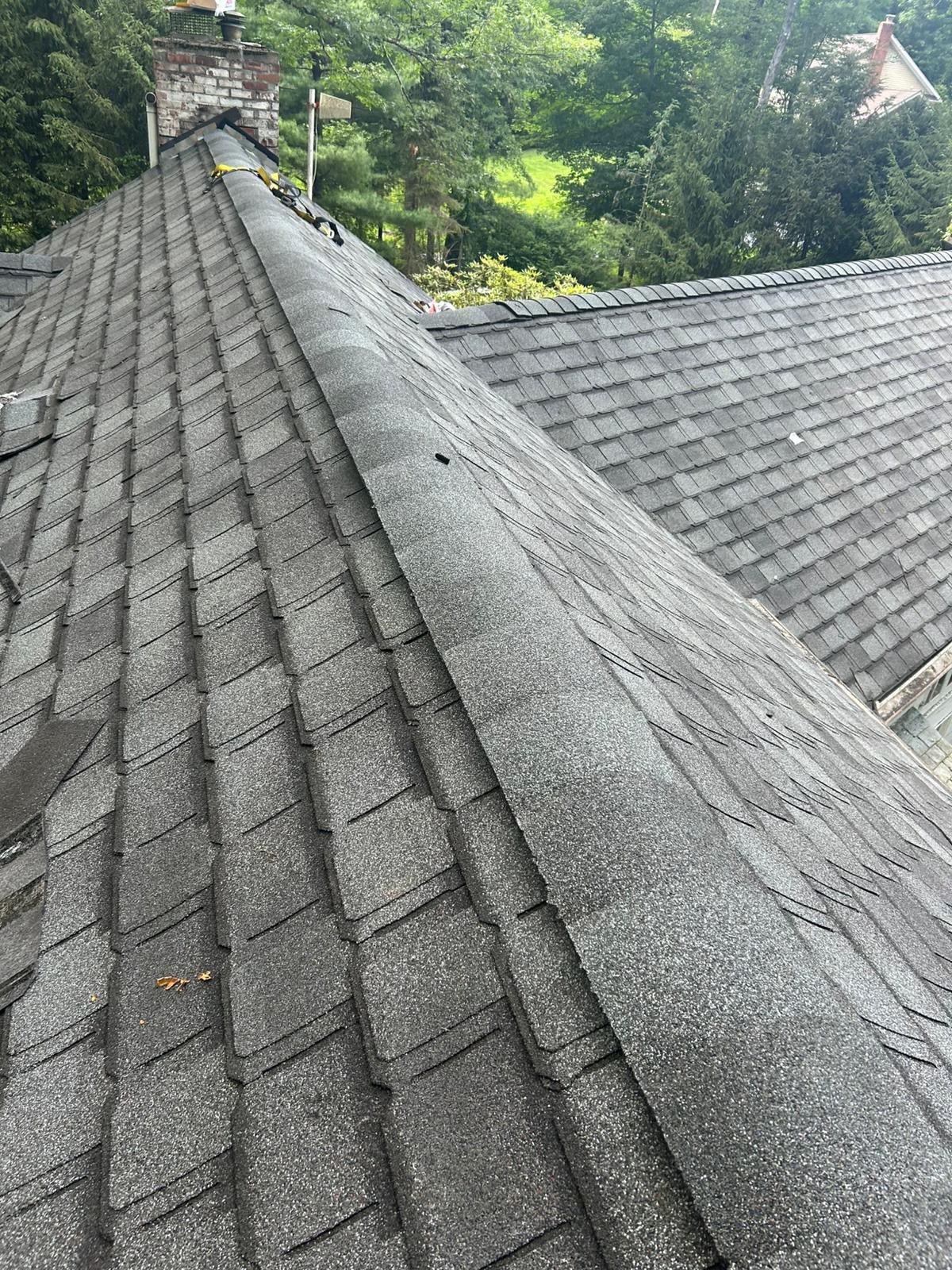 Finished gray Camelot architectural shingles and valley in Franklin Lakes NJ