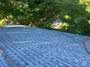 Completed main roof with charcoal architectural shingles in Wyckoff NJ