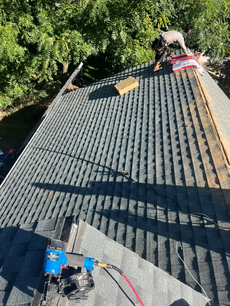 Crew installing architectural shingles during a Wyckoff NJ roof replacement
